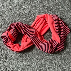 LuluLemon Vinyasa Scarf/Wrap
Navy and Coral Orange Stripe. 
14-snap closure.